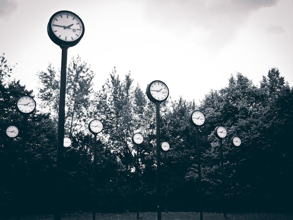 a clock tower with clocks on each of it