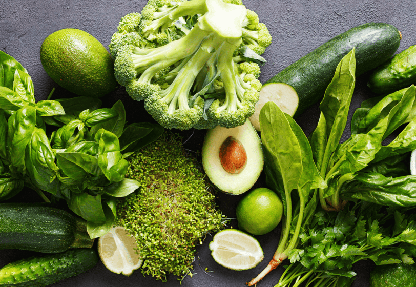 a variety of vegetables and fruits are shown on a table doing wholefood plant based diet