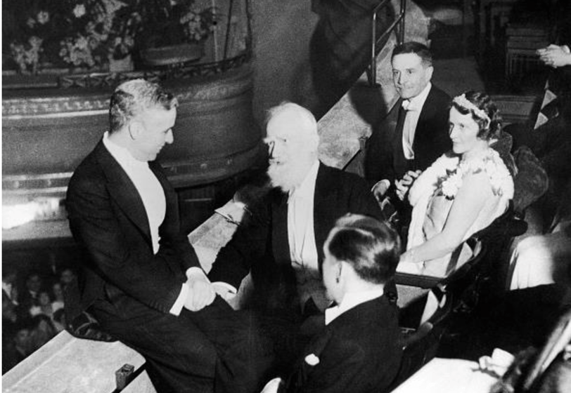 Nancy Astor seated at the 1931 City Lights premiere with Charlie Chaplin and George Bernard Shaw.