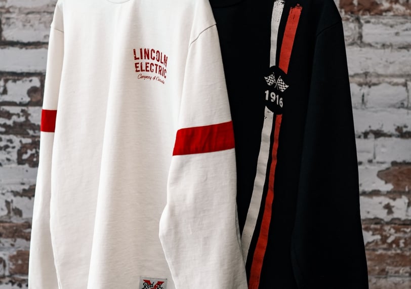 two shirts hanging on a clothes rack in a studio, Product photography, Amazon Photoshoot, Ecommerce 