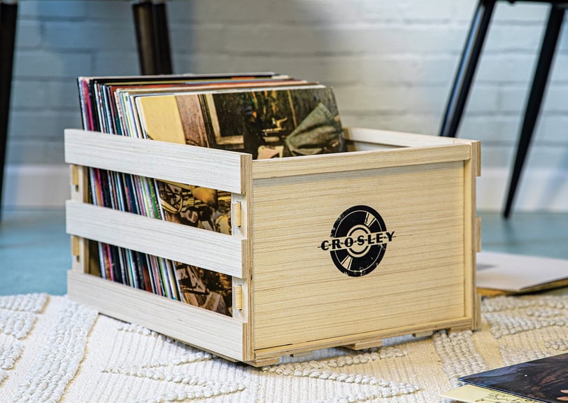 a wooden crate with a record player's record album