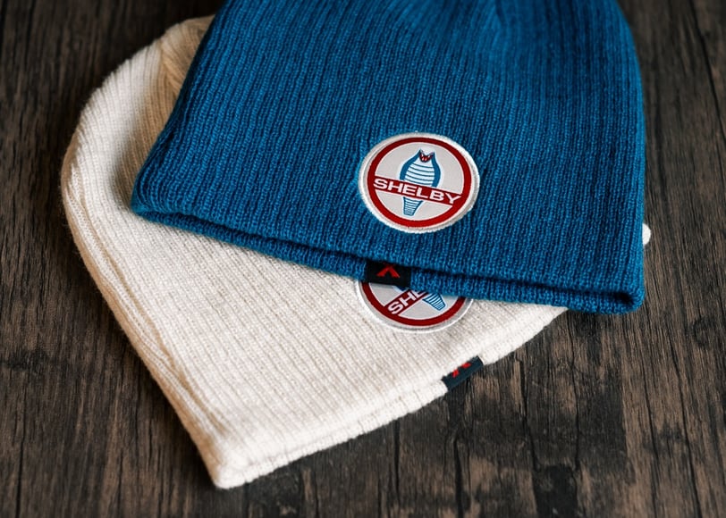 a pair of beanies with a blue and white hat, Product photography, Amazon Photoshoot, Ecommerce 
