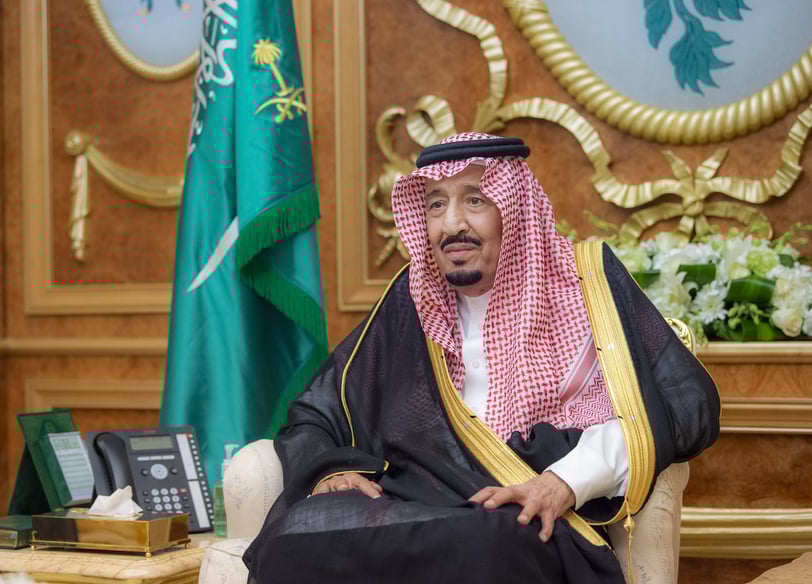 Salman bin Abdulaziz is sitting in a chair