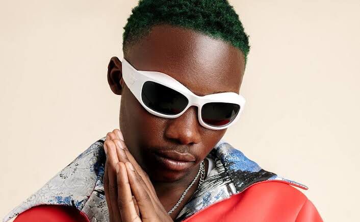 OliveTheBoy in black shades