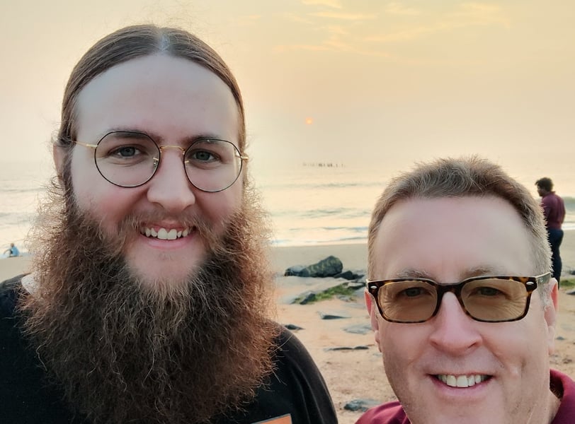 Handsome Akhada men at sunrise at Rock Beach in Puducherry