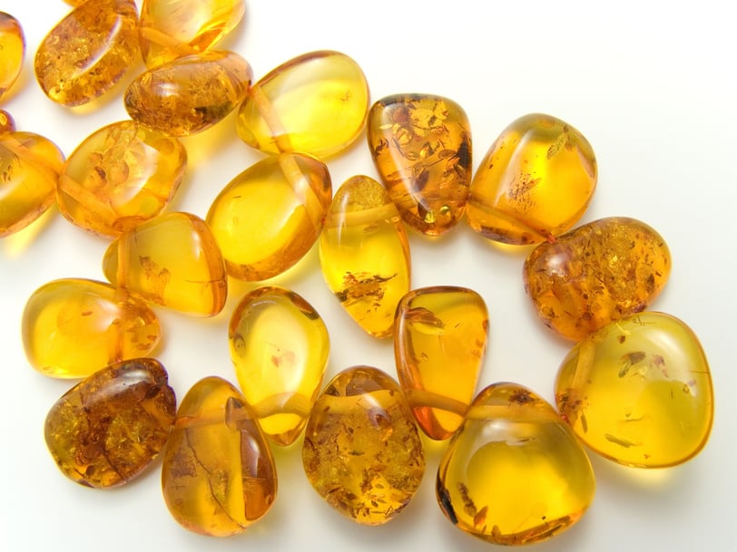 Polished Dominican amber stones with natural inclusions, popular gemstone souvenir from the Caribbean