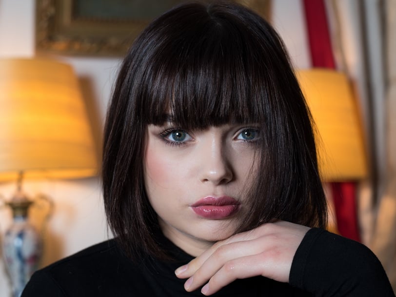 a woman with a black shirt and a black shirt