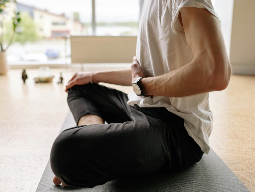 A man focusing on his breathe