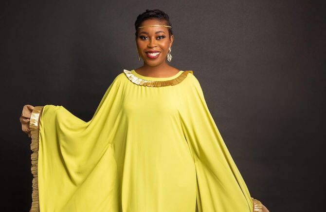 Queendalyn Yurglee in a gorgeous yellow dress.