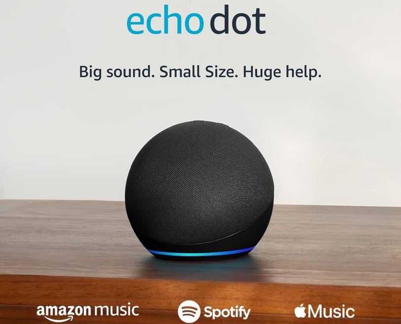 Echo Dot 5th Gen smart speaker on desk with LED display
