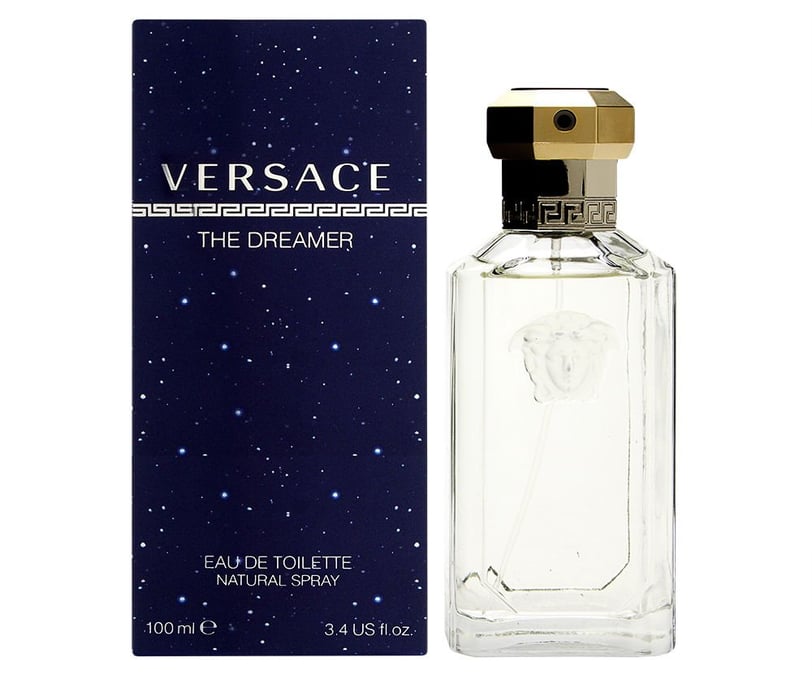 a perfume bottle with a perfume bottle next to it