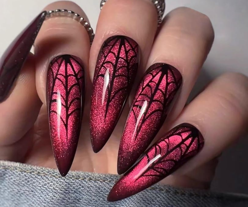 "Collection of spooky Halloween nail designs featuring colorful press-on nails for a perfect Hallowe