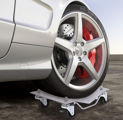 COSTWAY 4Pcs Tire Wheel Dollies with Lockable Casters and Handle in a Garage
