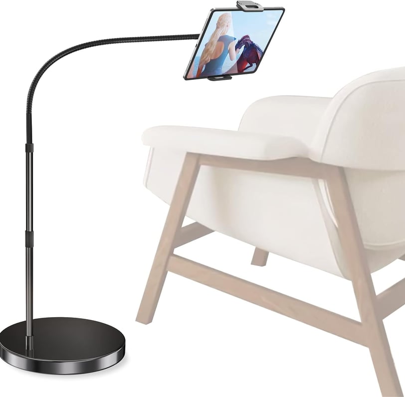 a tabletop with a tablet and a tablet on a chair