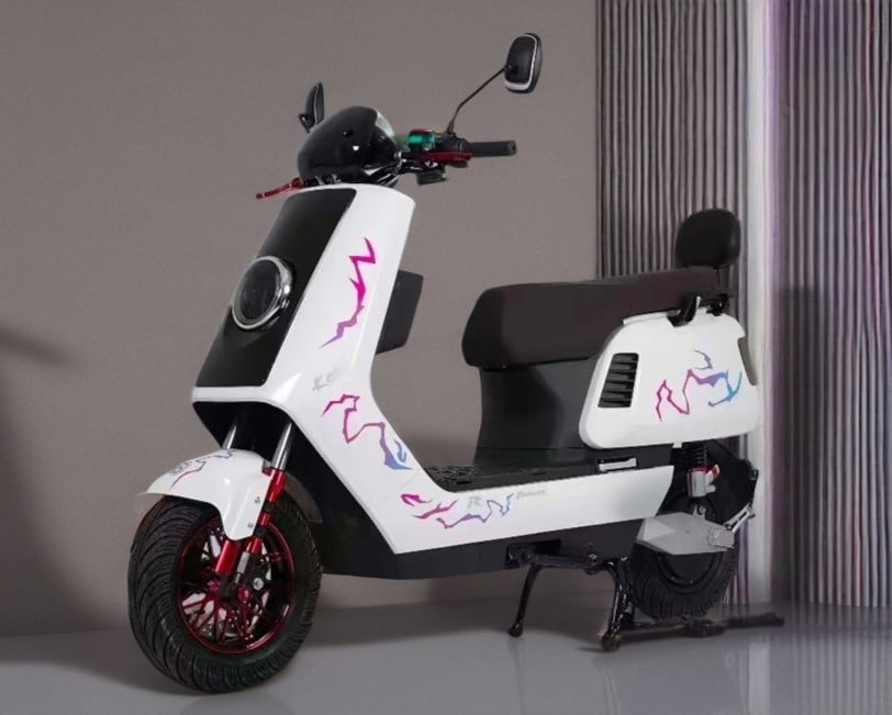 a scooter with graffiti on it