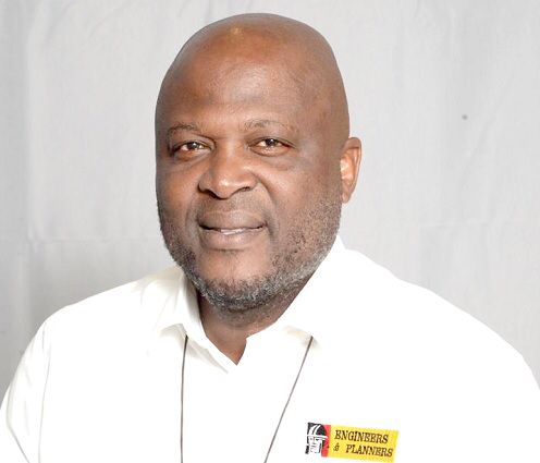 Ibrahim Mahama in an Engineers and Planners shirt.