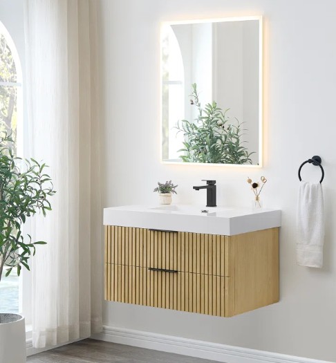 Regal Touch Home showcases a space-saving wall-mounted vanity with clean lines and storage drawers.