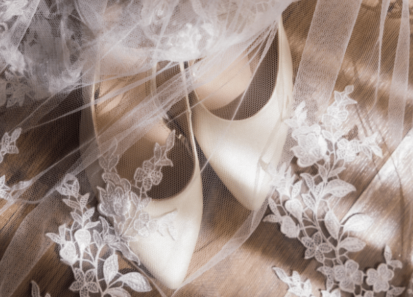 white color heels covers with vail
