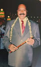Owner Manohar Lal ready to master the band during a night marriage show.