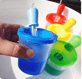 a person holding a cup of water in a cup