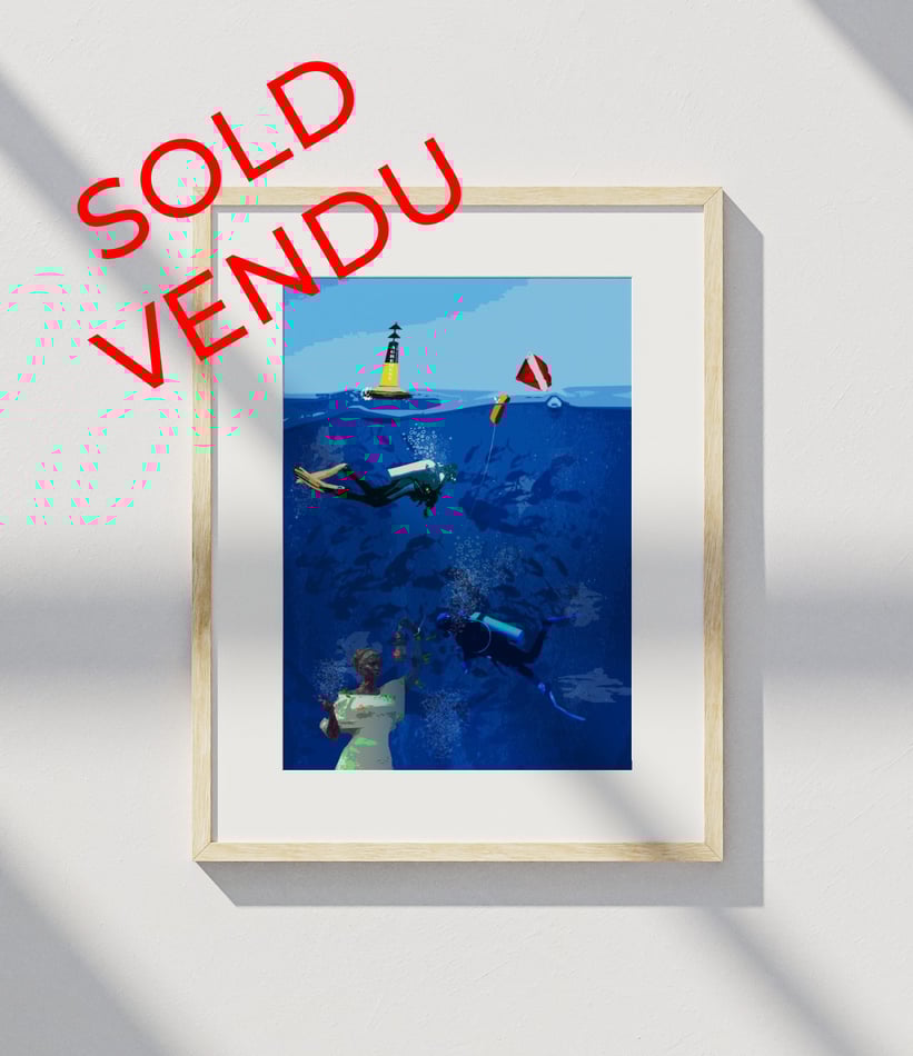 Framed underwater scene with scuba divers and statue