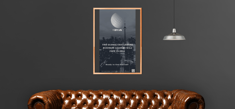 a couch with a poster of TEBYAN ebook on the wall
