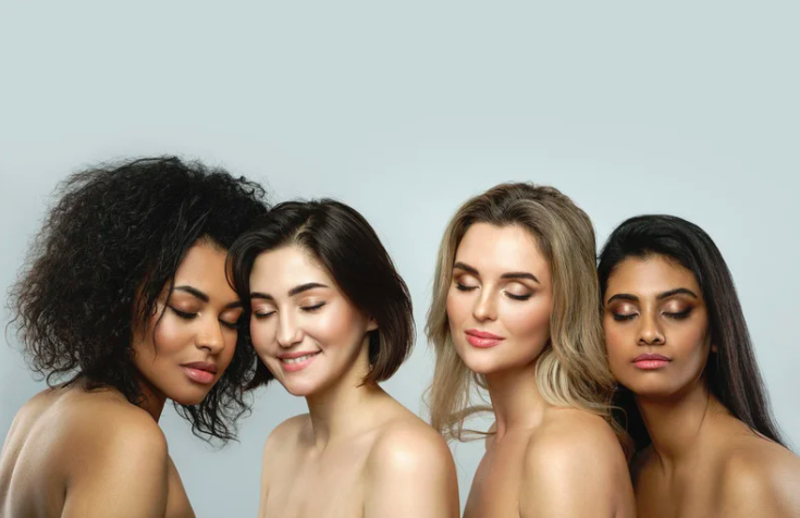 a group of women with different skin tones and hair