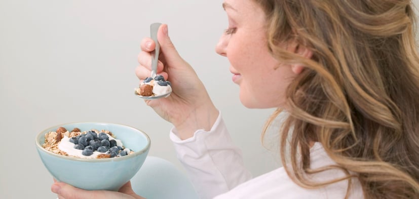 woman eating a Nutritious Breakfast