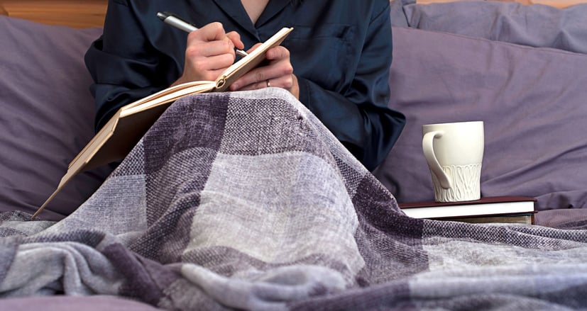 woman reflective journaling
