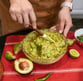 mixing-guacamole-dip-in-large-bowl