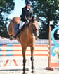 Femme à l'octacle avec un cheval