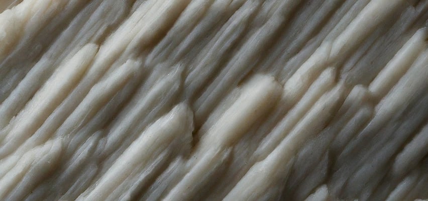 a close up of a piece of marbled marble