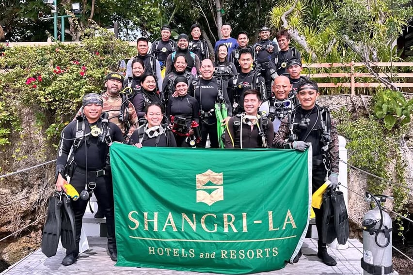 Group photo in the jetty port before scuba diving