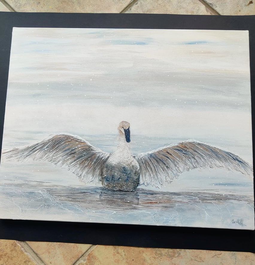 Paintings of a bird on water during winter