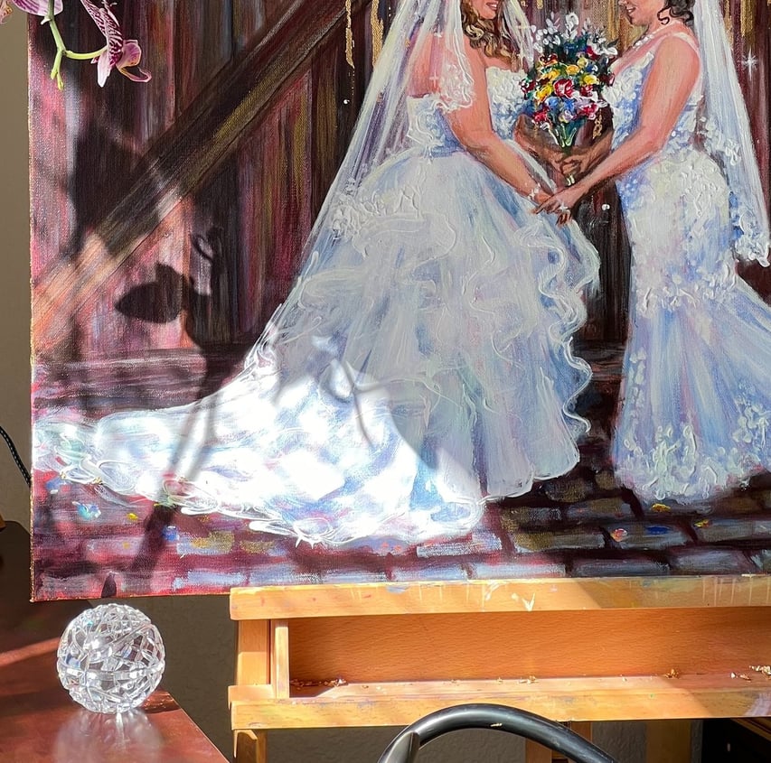 Beautiful two brides looking at each other in Live wedding painting by Nominsstudio.com