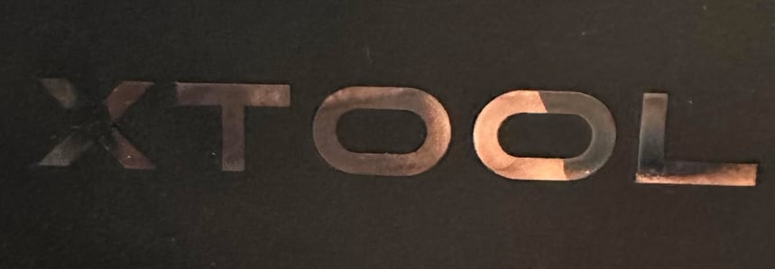 a close up of a black and green computer monitor