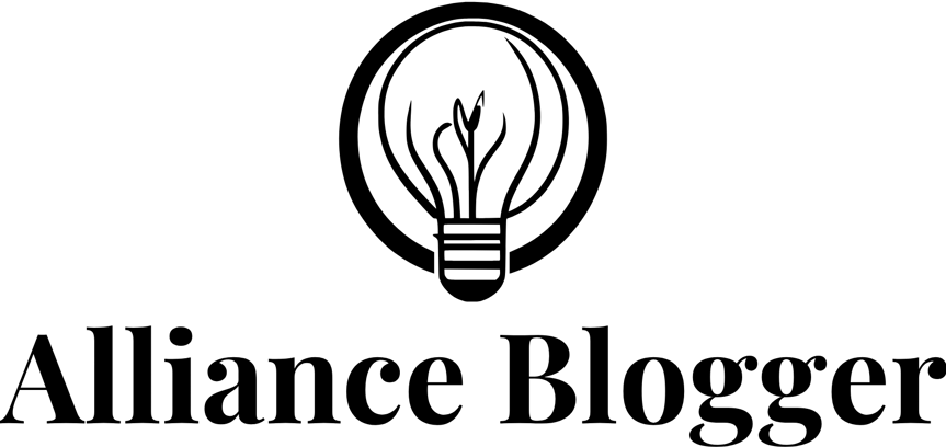 a man in a suit and tie with a tie alliance blog logo