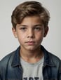Portrait of a young boy with a blue shirt and a denim jacket
