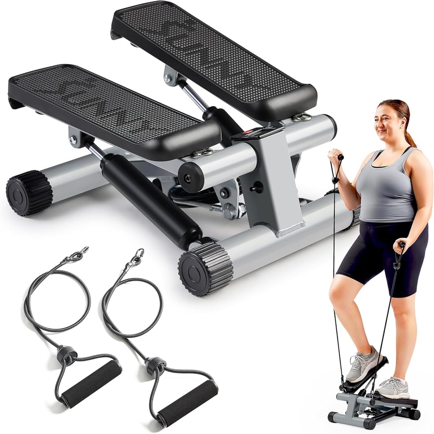 a woman standing on a stationary stepper