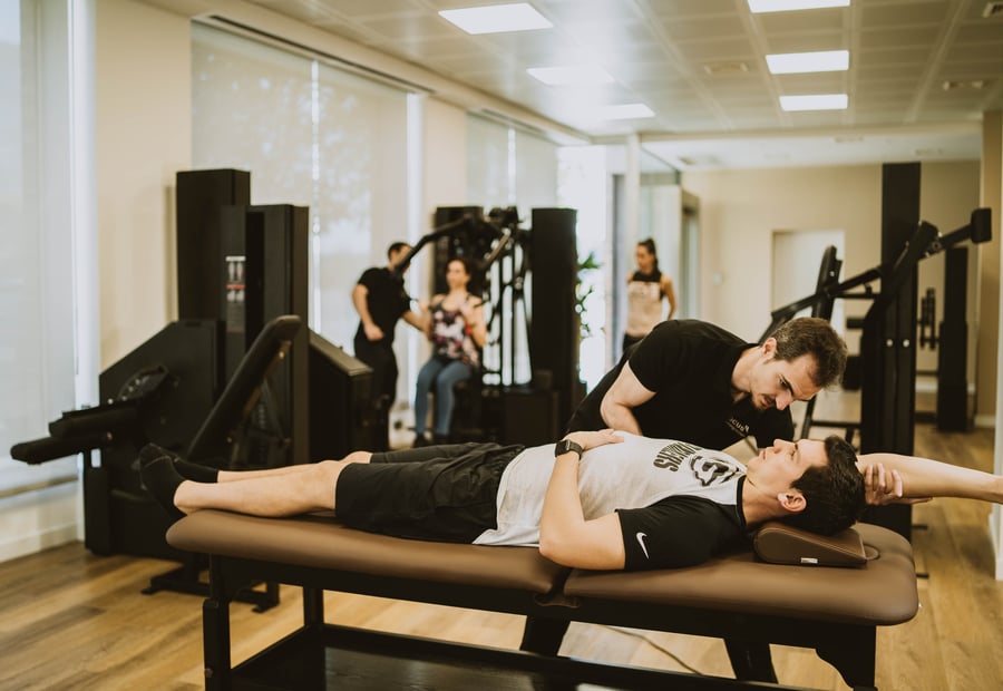 Activación muscular en camilla