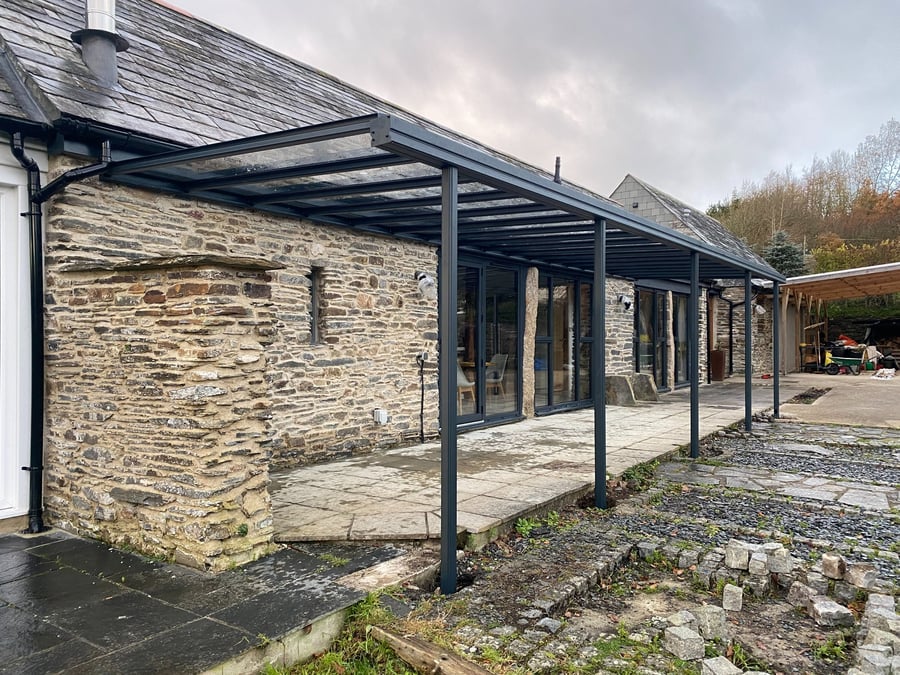 Harbour carport stone cottage