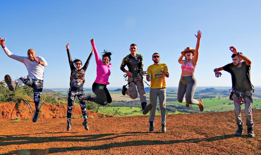 A picture of happy subscribers cheering and jumping up.