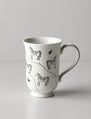 white ceramic mug for writing with elegant horse and bird designs in black. From Joyvity.
