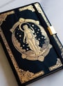 a journal, representing a thoughtful affordable gift idea under $30 for creat