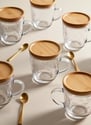 a coffee or tea mug, representing a thoughtful affordable gift idea under $30 for creati