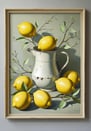 Still life lemon artwork in a beige frame featuring a white pitcher and branches.