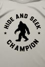 Hide and Seek Champion T-shirt with Bigfoot silhouette, novelty gift for men