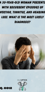 a woman holding her head as she experiences vertigo symptoms