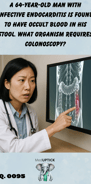 a female Asian physician pointing to a colonic area of concern on an abdominal x-ray