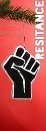 a resist fist ornament